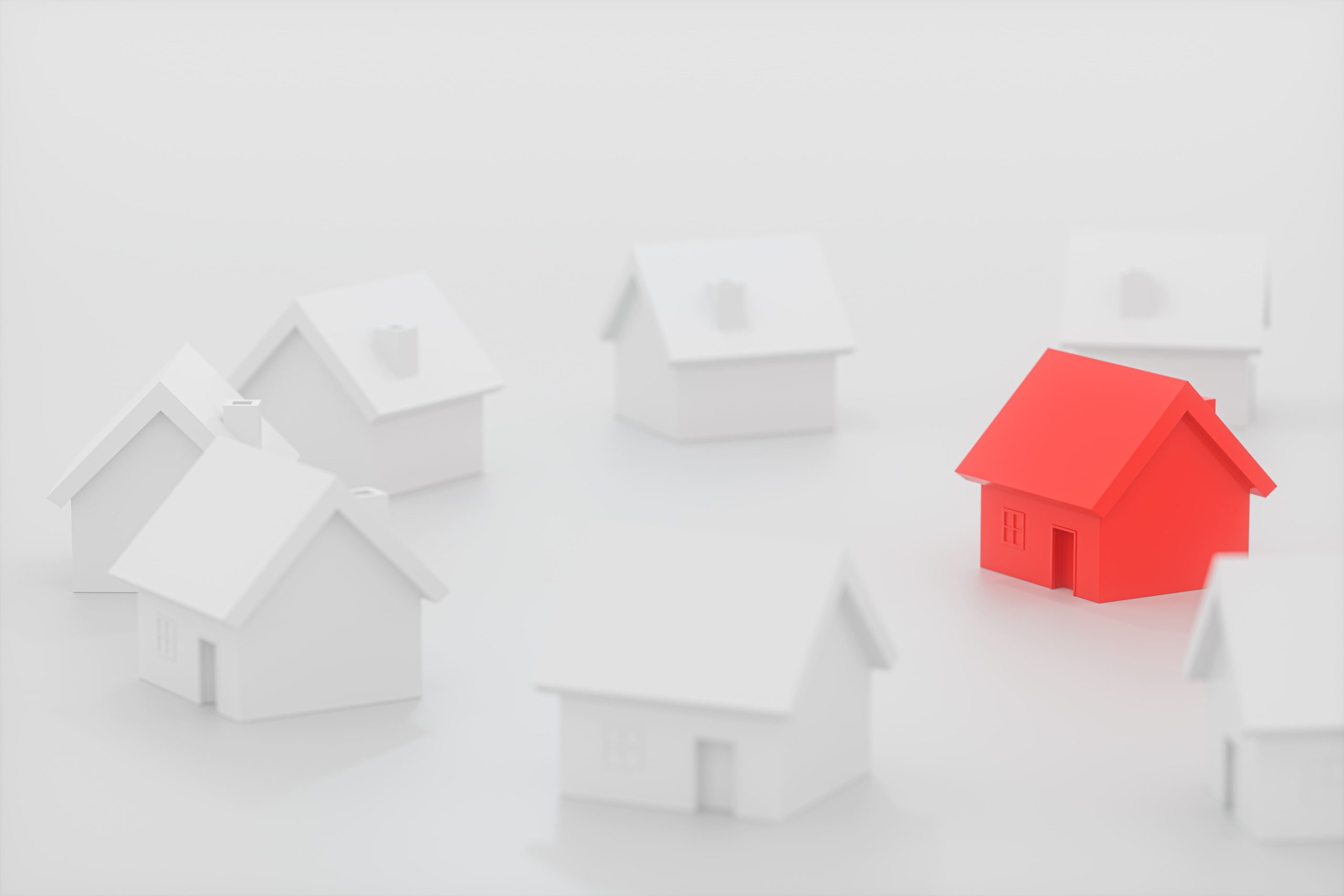 vecteezy_a-small-red-house-model-surrounded-by-the-white-houses-3d_27855393